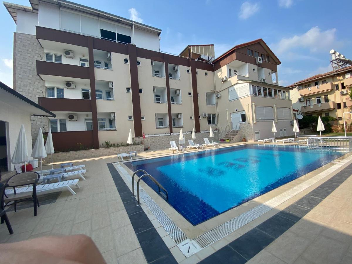 Elvin Otel Side Bagian luar foto