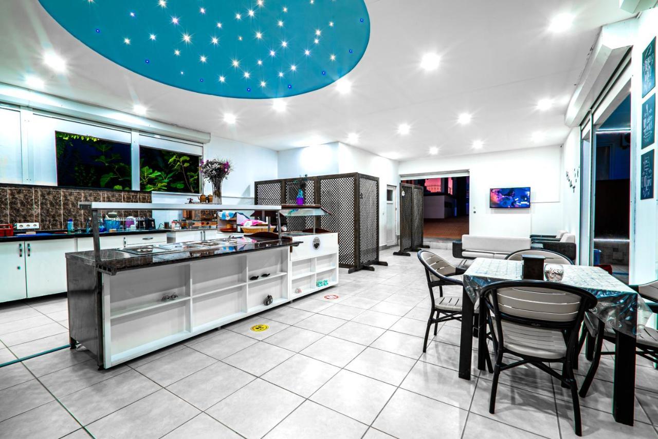 Elvin Otel Side Bagian luar foto