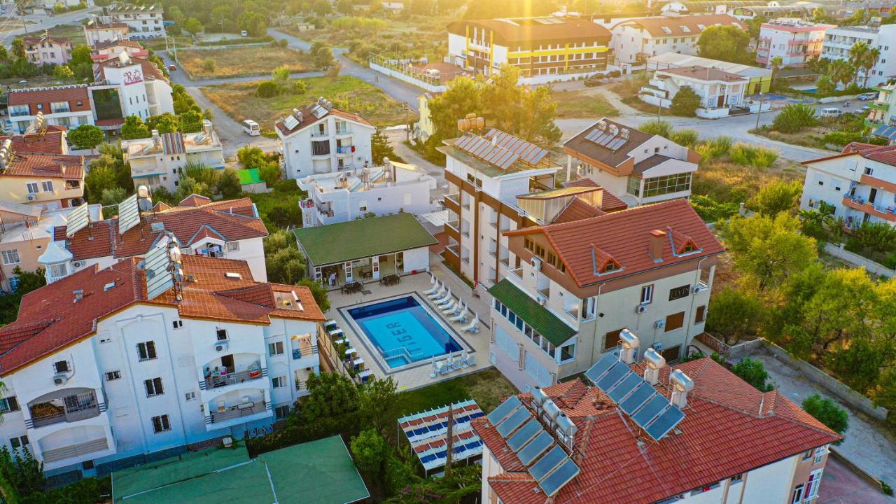 Elvin Otel Side Bagian luar foto