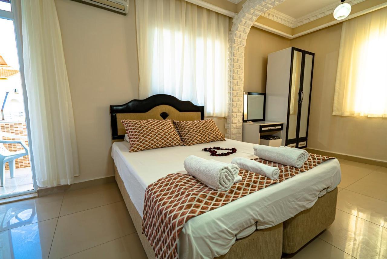 Elvin Otel Side Bagian luar foto