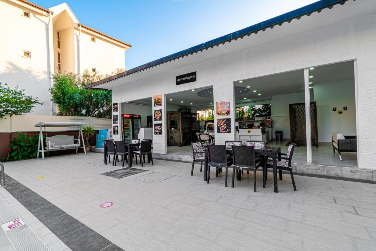 Elvin Otel Side Bagian luar foto