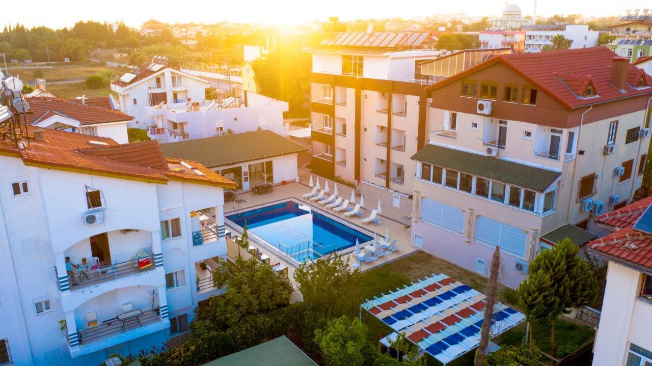 Elvin Otel Side Bagian luar foto