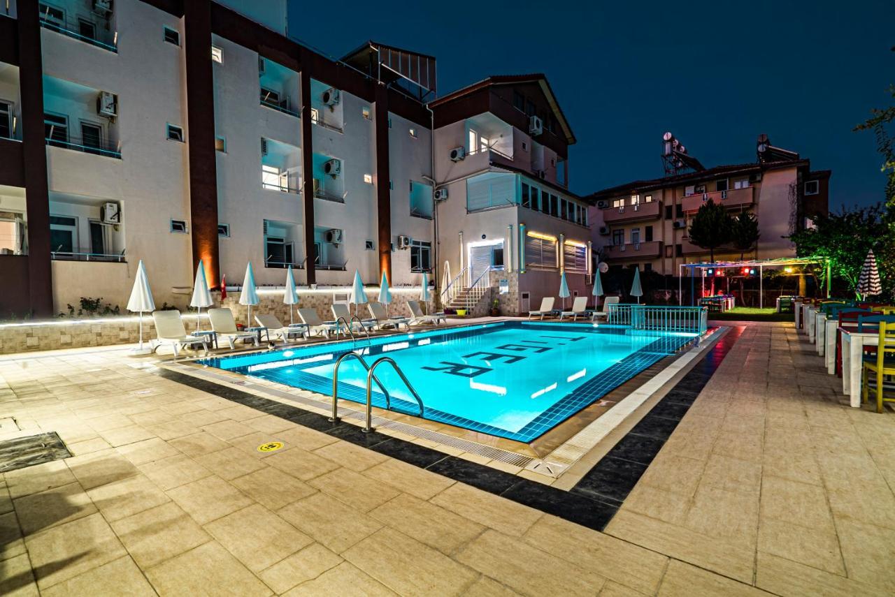 Elvin Otel Side Bagian luar foto