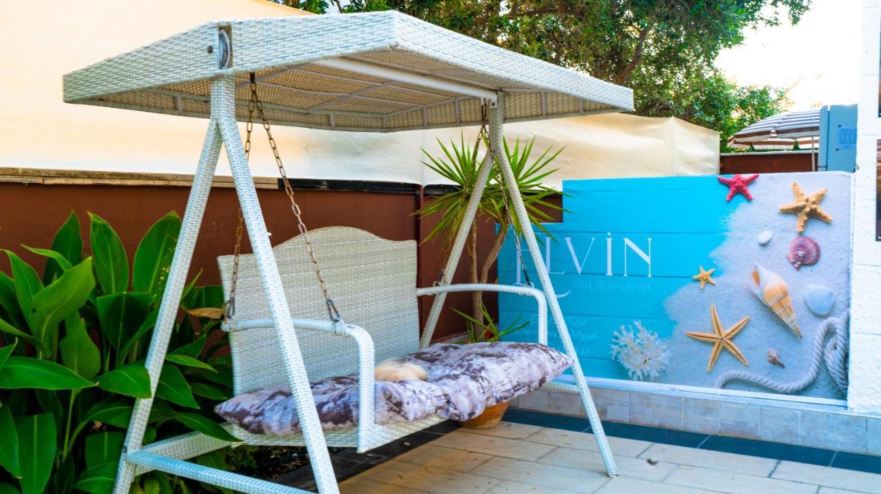 Elvin Otel Side Bagian luar foto