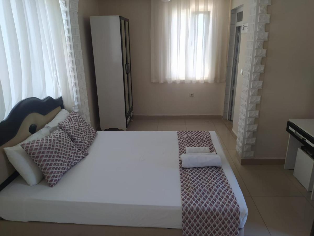 Elvin Otel Side Bagian luar foto