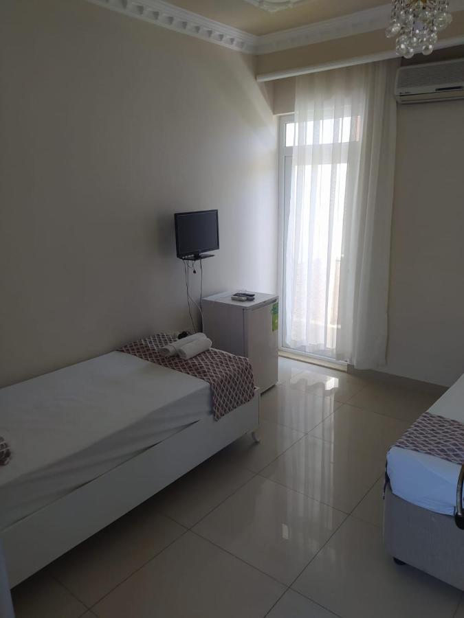 Elvin Otel Side Bagian luar foto
